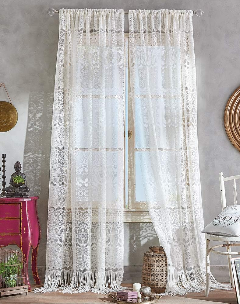 A close-up view of White Lace Curtains for Bedroom draping gently by a sunlit window, creating a warm and inviting atmosphere.