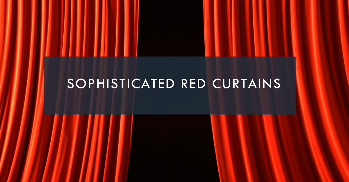 Red curtains in a modern, minimalist decor.